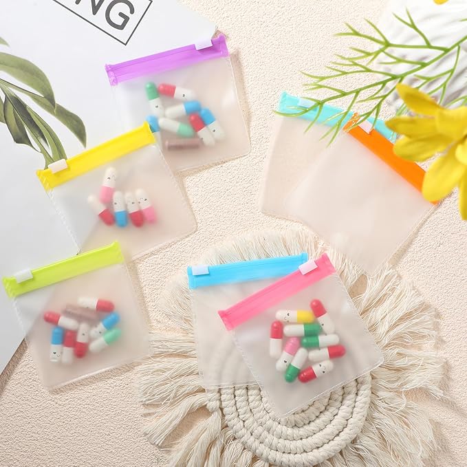 70 Pcs Weekly Pill Pouch Bags Zippered Reusable Medicine Organizer Set Self Sealing Medicine Organizer Travel Plastic Pill Bags with Slide Lock for Small Items Storage(Bright Style)