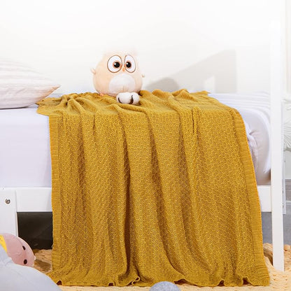 NTBAY Cable Knit Cooling Toddler Blanket, Soft and Breathable Baby Blanket 30x40 Inches Made from Rayon Derived from Bamboo for Crib, Stroller, Nursery, Ginger Yellow