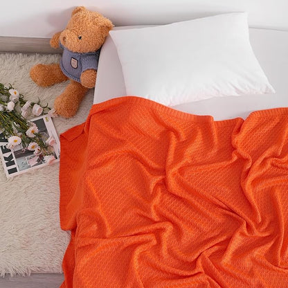 NTBAY Cable Knit Cooling Toddler Blanket, Soft and Breathable Baby Blanket 30x40 Inches Made from Rayon Derived from Bamboo for Crib, Stroller, Nursery, Orange